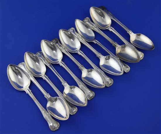 A set of twelve George IV silver double struck Kings pattern dessert spoons, 24 oz.